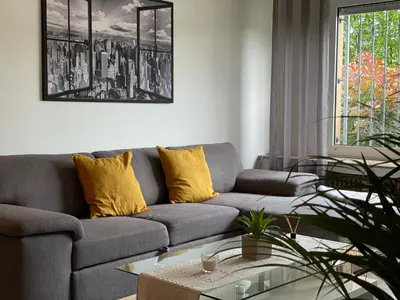 Ein Sitzbereich in der Unterkunft Apart70-Modern Design I Garden with Terrace I Smart TV I Free Parking I Free WiFi