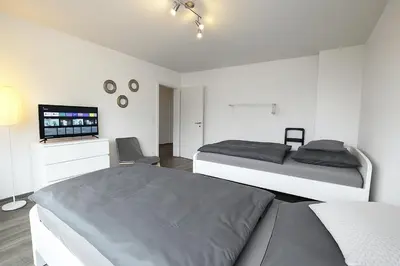Ein Bett oder Betten in einem Zimmer der Unterkunft VAZ Apartments Freiheit 2 für Monteure