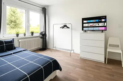 Ein Bett oder Betten in einem Zimmer der Unterkunft VAZ Apartments Freiheit 2 für Monteure