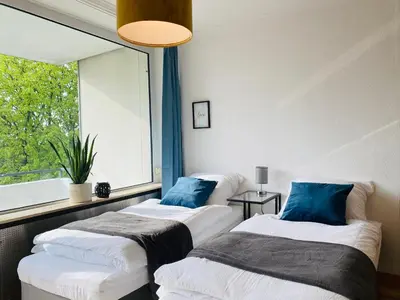 Ein Bett oder Betten in einem Zimmer der Unterkunft KYANIT APARTMENT: FREE PARKING + POOL + NETFLIX