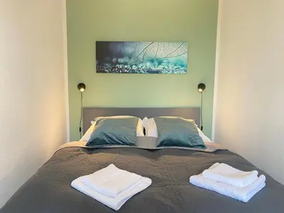 Ein Bett oder Betten in einem Zimmer der Unterkunft KYANIT APARTMENT: FREE PARKING + POOL + NETFLIX