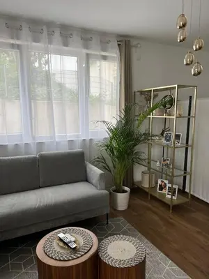 Ein Sitzbereich in der Unterkunft Moderne Wohnung mit 4 Betten