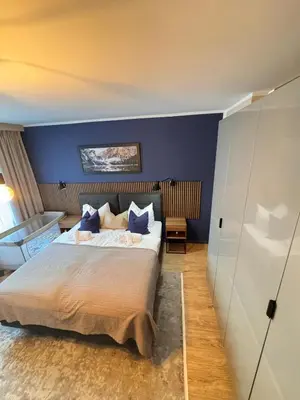 Ein Bett oder Betten in einem Zimmer der Unterkunft Zentrale Wohnung direkt am Hauptbahnhof - Bismarck