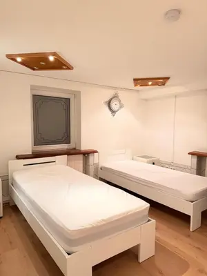 Ein Bett oder Betten in einem Zimmer der Unterkunft KM Apparts 2 Wesel
