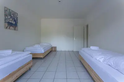 Ein Bett oder Betten in einem Zimmer der Unterkunft T&K Apartments Oberhausen 2 room Apartments
