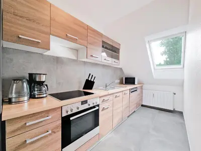 Küche/Küchenzeile in der Unterkunft Tolstov Apartments - 3 and 4 Room Apartments