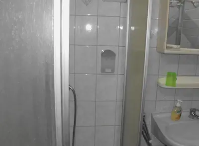 Ein Badezimmer in der Unterkunft Lovely Apartment 2 Et Inkl Parkplatz nach Verfügbarkeit