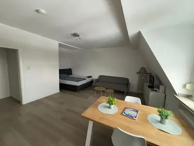 Ein Sitzbereich in der Unterkunft Apartment City und Stadionnah