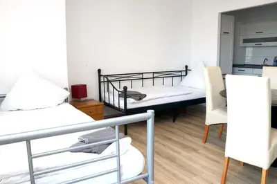 Ein Bett oder Betten in einem Zimmer der Unterkunft Ferienwohnung A 101