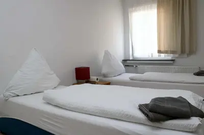 Ein Bett oder Betten in einem Zimmer der Unterkunft Ferienwohnung A 101