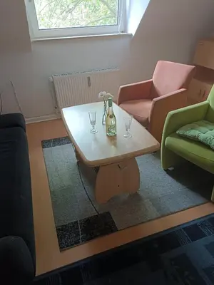 Ein Sitzbereich in der Unterkunft Nette Kuschelige Wohnung