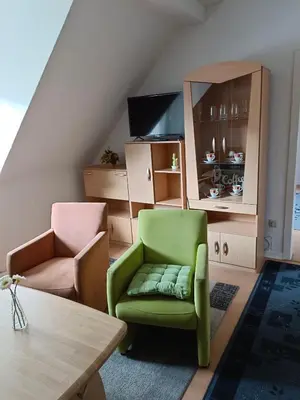 Ein Sitzbereich in der Unterkunft Nette Kuschelige Wohnung