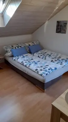 Ein Bett oder Betten in einem Zimmer der Unterkunft Stadt-Land-Fluss