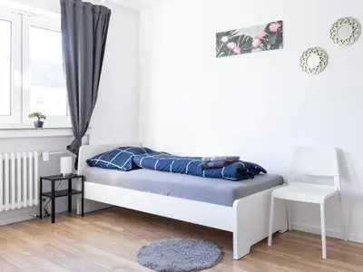 Ein Bett oder Betten in einem Zimmer der Unterkunft VAZ Apartments Home-at-Work für Monteure und Fachkräfte TV, WLAN, Balkon, Küche, Parkplatz