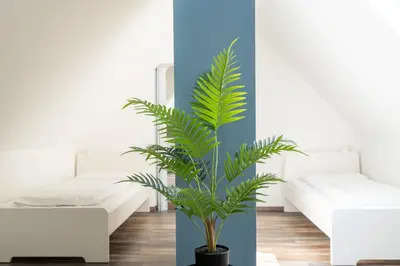 Ein Bett oder Betten in einem Zimmer der Unterkunft XXL Superior Apartment 1 - 1 bis 10 Personen