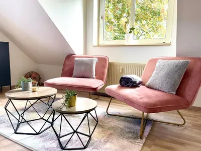 Ein Sitzbereich in der Unterkunft Zuhause im Ruhrgebiet 2 mit Balkon