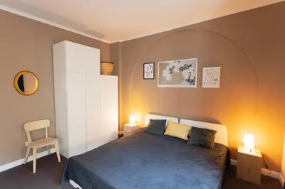 Ein Bett oder Betten in einem Zimmer der Unterkunft Huge apartment with Sauna and free parking