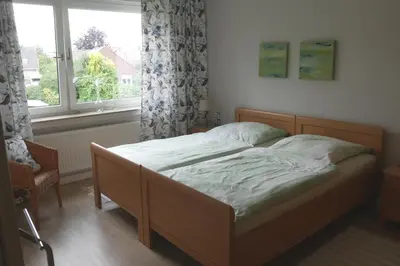 Ein Bett oder Betten in einem Zimmer der Unterkunft Ferienwohnung Illerhues
