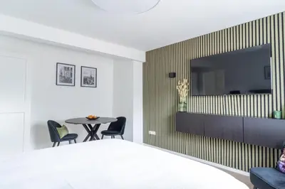 TV/Unterhaltungsangebot in der Unterkunft Green Flat Düsseldorf First