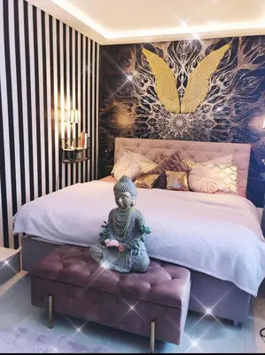 Ein Bett oder Betten in einem Zimmer der Unterkunft Idyllisches Nest über den Dächern