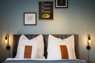 Ein Bett oder Betten in einem Zimmer der Unterkunft Maracoon - Suite Apartments Essen Messe I Great location