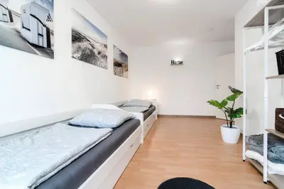 Ein Bett oder Betten in einem Zimmer der Unterkunft Top Ausstattung Netflix WLAN Landschaftspark