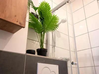 Ein Badezimmer in der Unterkunft Serviceroom24 - Apartment 1 in Recklinghausen Hoch WLAN - Smart-TV - 24-7 Check-in und Küche