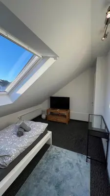Ein Bett oder Betten in einem Zimmer der Unterkunft Apartmenthaus Somborn