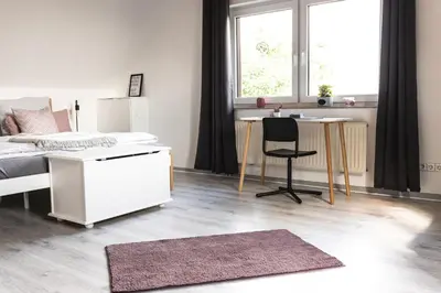 Ein Bett oder Betten in einem Zimmer der Unterkunft Auszeit Altenhorst, Gartenferienwohnung