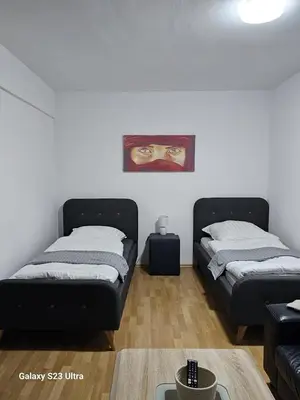 Ein Bett oder Betten in einem Zimmer der Unterkunft M&L Wohnen 2