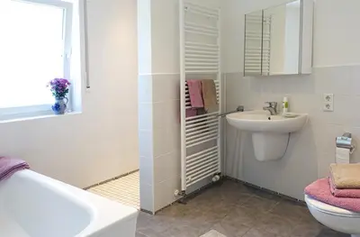 Ein Badezimmer in der Unterkunft Penthaus Kranichholz