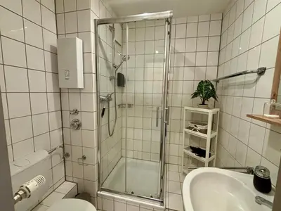Ein Badezimmer in der Unterkunft Zentral & Modern nahe Hauptbahnhof mit Privatparkplatz & schnellem WLAN