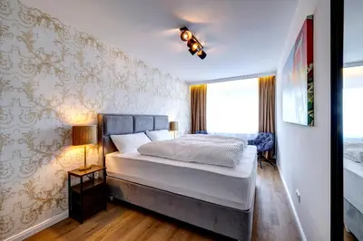 Ein Bett oder Betten in einem Zimmer der Unterkunft Luxusapartment, Rüttenscheid, zwei Parkplätze