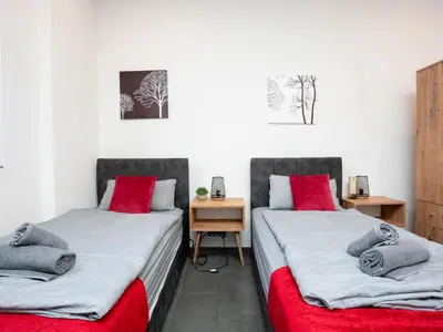 Ein Bett oder Betten in einem Zimmer der Unterkunft Serviceroom24 - Apartment 2 in Recklinghausen Hoch WLAN - Smart-TV - 24-7 Check-in und Küche