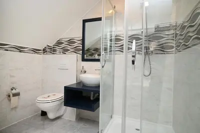 Ein Badezimmer in der Unterkunft Ferienwohnung&Aparts By kispet group hotels in Oberhausen