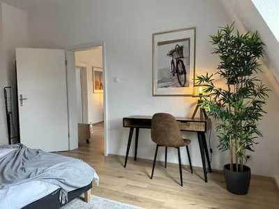 Ein Bett oder Betten in einem Zimmer der Unterkunft Stylish im Altbau, Netflix, Sonos, nahe 3M und Vorwerk
