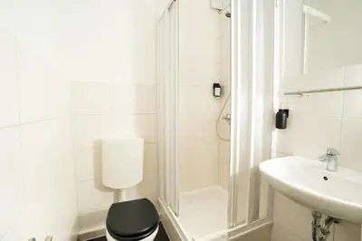 Ein Badezimmer in der Unterkunft SHIN APARTMENTS