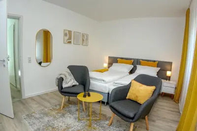 Ein Bett oder Betten in einem Zimmer der Unterkunft FeWo Dortmund Westfalenhalle, Stadion & Uni fußläufig