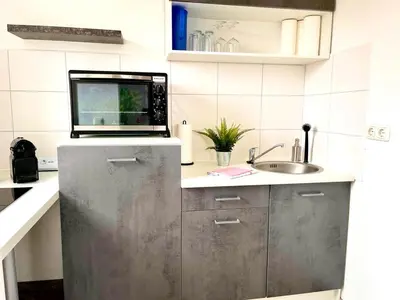 Küche/Küchenzeile in der Unterkunft Zuhause im Ruhrgebiet 3 mit Balkon