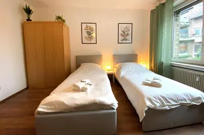 Ein Bett oder Betten in einem Zimmer der Unterkunft Cozy Apartment in Oberhausen