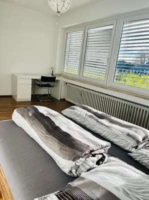 Ein Bett oder Betten in einem Zimmer der Unterkunft NaSa Wohnung Uerdingen