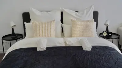 Ein Bett oder Betten in einem Zimmer der Unterkunft Modern & Zentral - 30 min bis zur Messe in Köln & Düsseldorf