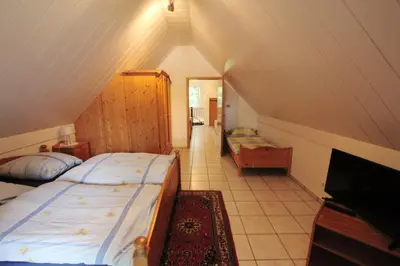 Ein Bett oder Betten in einem Zimmer der Unterkunft Ferienhaus Schulze Beikel mit Garten & Terrasse - Borken-Marbeck