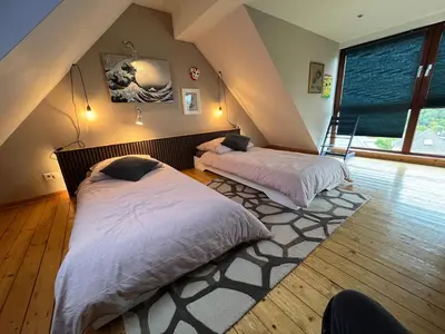 Ein Bett oder Betten in einem Zimmer der Unterkunft Ferienhaus Brinker Bleibe