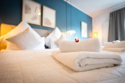 Ein Bett oder Betten in einem Zimmer der Unterkunft Super zentral I Frisch renoviert
