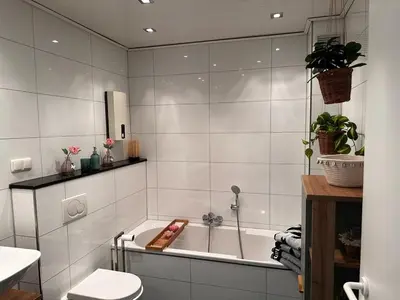 Ein Badezimmer in der Unterkunft A&V Apartments Wunderschöne Rheinblick Wohnung zum entspannen Apt Ela