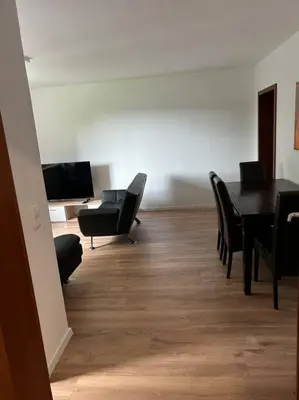 Ein Sitzbereich in der Unterkunft Moderne Service Apartment AVD3