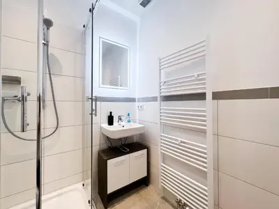 Ein Badezimmer in der Unterkunft Apartment Düsseldorf City