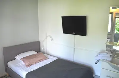 Ein Bett oder Betten in einem Zimmer der Unterkunft AV No.1