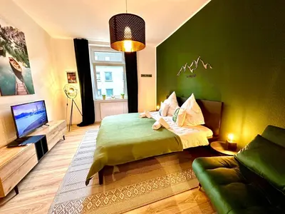 Ein Bett oder Betten in einem Zimmer der Unterkunft Das Berg Apartment Rüttenscheid, Netflix, nahe Messe, Klinikum